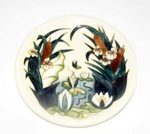 A Moorcroft pottery plate