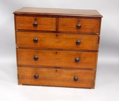 A Victorian oak chest of drawers