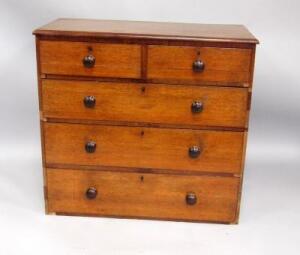 A Victorian oak chest of drawers