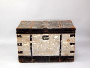 A Victorian painted and metal bound wooden sea chest