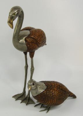A composite and white metal figure of a partridge
