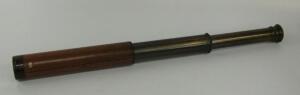 A brass and leather bound four draw telescope, 83cm long extended. - 2