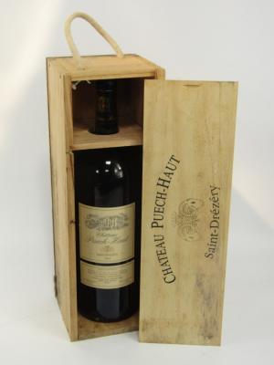 A bottle of Chateau Puech-Haut Saint Drezery 2004