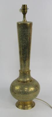 A Persian brass table lamp