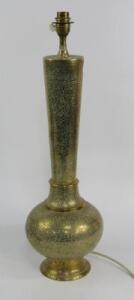 A Persian brass table lamp