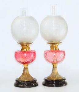 A pair of Duplex brass oil lamps