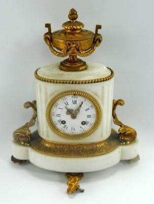 A late 19thC French white marble and gilt metal mantel clock