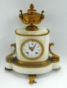 A late 19thC French white marble and gilt metal mantel clock