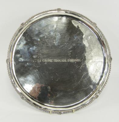 A Continental white metal circular salver