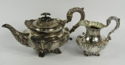 A William IV silver teapot and cream jug