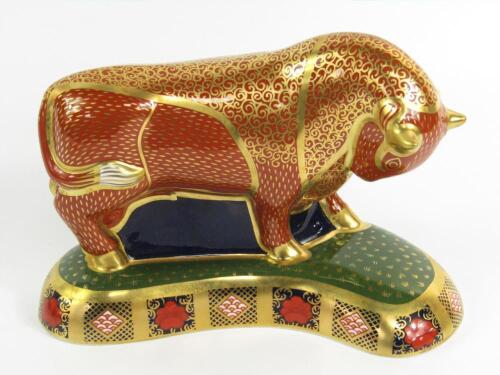 A Royal Crown Derby Imari porcelain paperweight modelled as the Harrods Bull