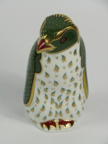 A Royal Crown Derby Imari porcelain paperweight modelled as the Rockhopper Penguin