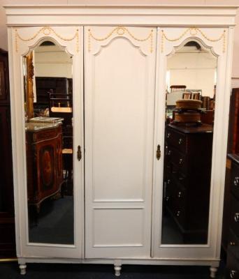 An Edwardian white painted triple section linen press