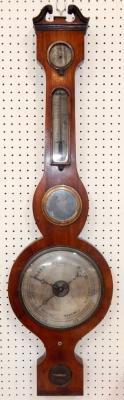 A Victorian rosewood wheel barometer