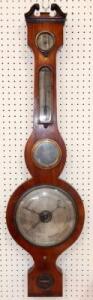 A Victorian rosewood wheel barometer