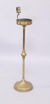 An Art Nouveau brass smoker's stand