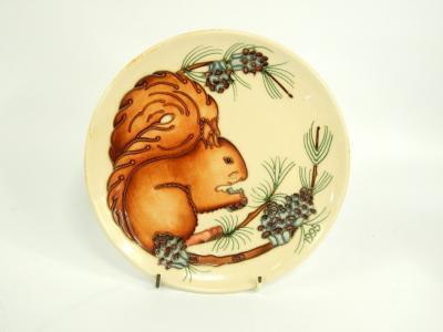 A Moorcroft pottery plate