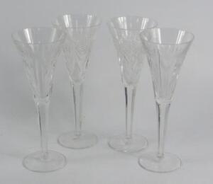 Two pairs of Waterford cut glass champagne flutes
