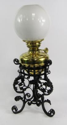 A Victorian cast iron oil lamp
