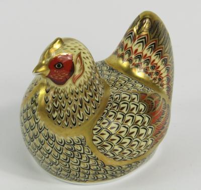 A Royal Crown Derby Imari porcelain paperweight modelled as the Farmyard Hen