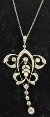 A Victorian belle &eacute;poque diamond and seed pearl drop pendant