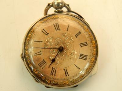 A lady's white metal cased pocket watch
