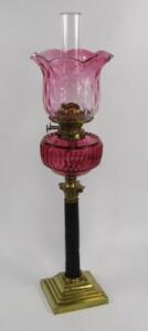 A Duplex brass and blackened metal Corinthian column oil lamp