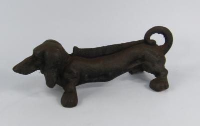 A cast iron boot scraper