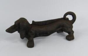 A cast iron boot scraper