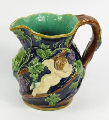 A Victorian Minton majolica bacchanalian jug