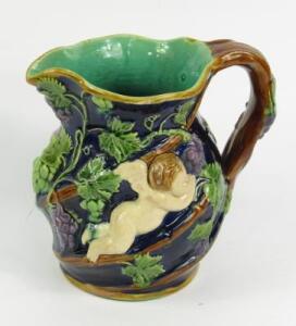 A Victorian Minton majolica bacchanalian jug
