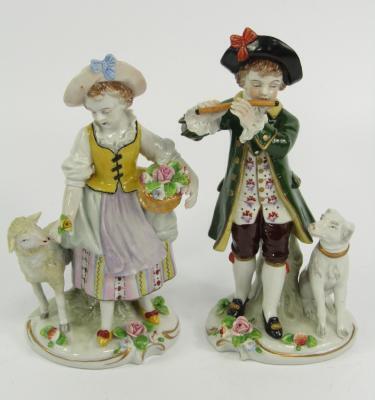 A pair of Sitzendorf porcelain figures
