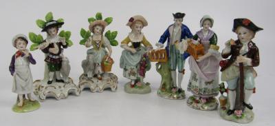 A group of Sitzendorf porcelain and other figures