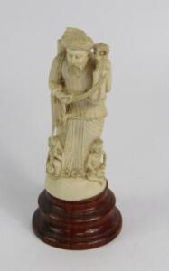 An Indian ivory carving of a musician