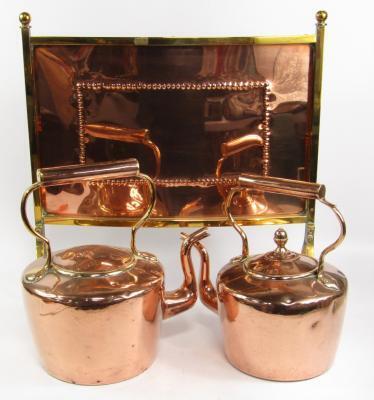 A brass and copper convex fire screen