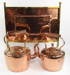 A brass and copper convex fire screen