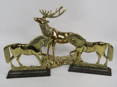 A pair of Victorian brass door stops