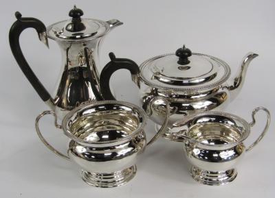 A George V silver four piece tea and coffee set