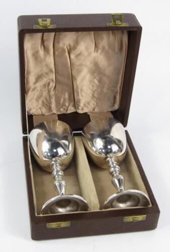 A pair of Garrard silver goblets