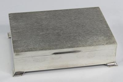 A silver twin division cigarette box