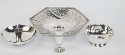 A white metal hexagonal sweetmeat dish