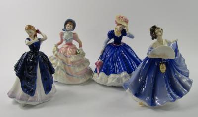 Four Royal Doulton figures