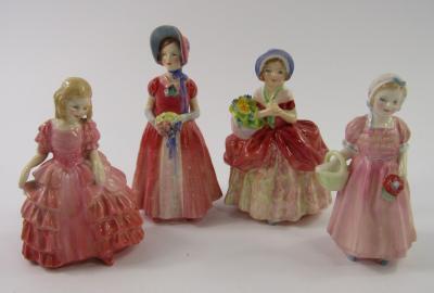 Four Royal Doulton figures
