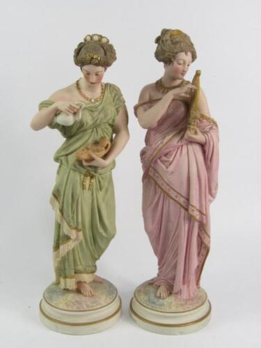 A pair of Robinson and Leadbetter Parian figures of Roman ladies