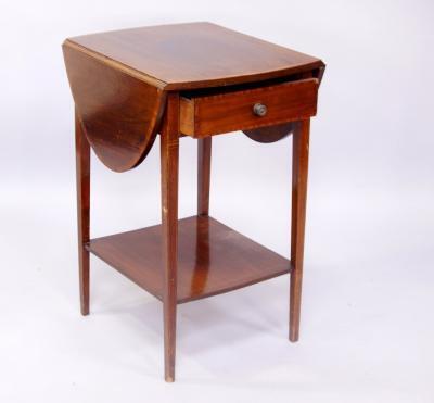 An Edwardian mahogany and satinwood cross banded drop leaf occasional table