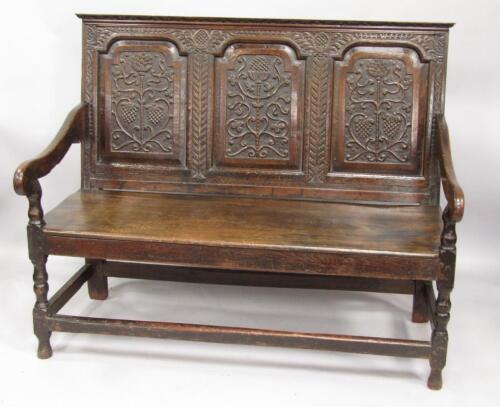 A 17thC oak settle