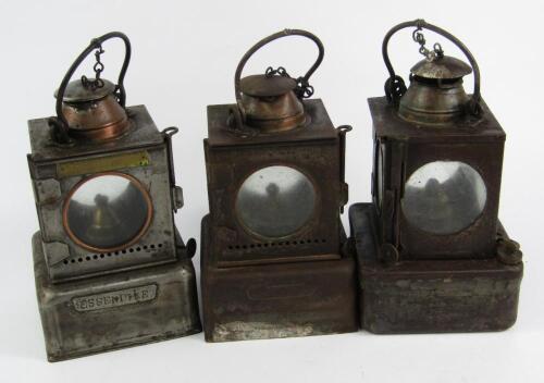 A group of three LNER railwayman's lamps
