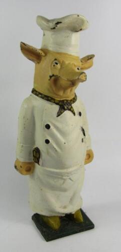 A cast iron painted pig butcher's advertising sign