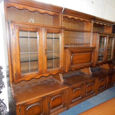A German oak three section shrank display cabinet.