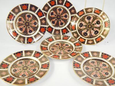 A set of twelve Royal Crown Derby porcelain tea plates